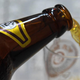 Beer pouring into glass from bottle